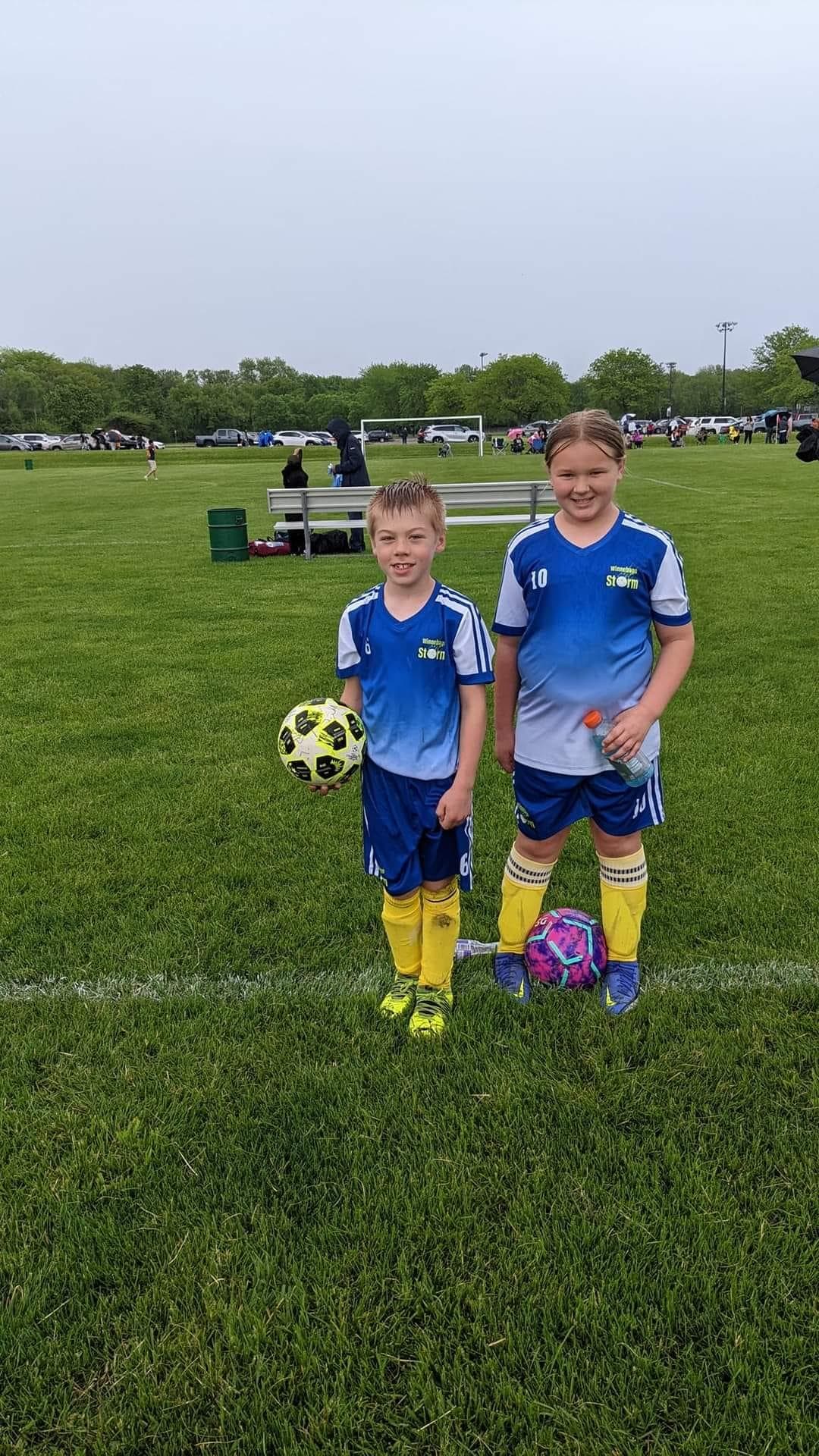 Boys and girls play soccer