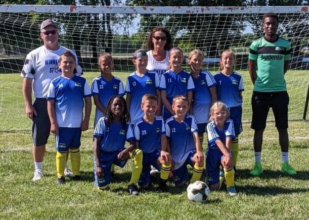 Christian with U12 team 2022